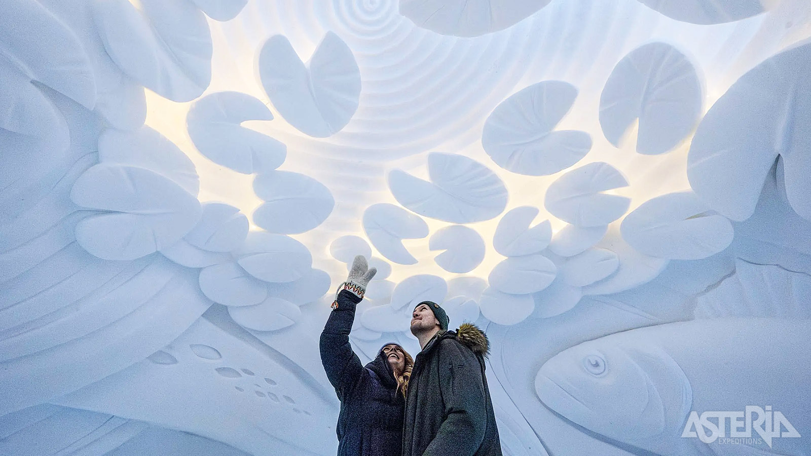 In het Arctic SnowHotel ontdek de verschillende Ice Suite, een ijskapel, bar en restaurant