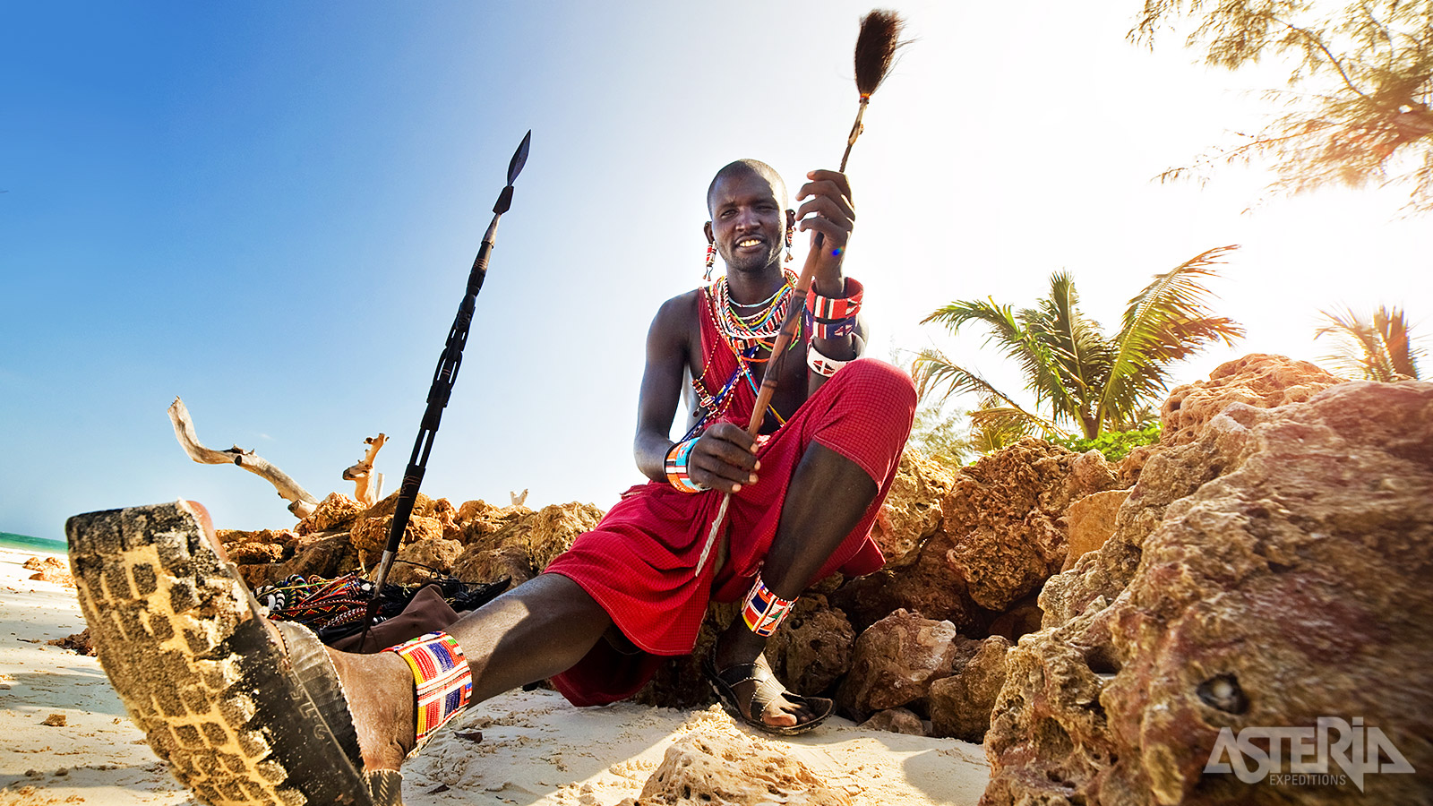 In Masai Mara leeft het seminomadische Masaivolk met hun typische rode gewaden