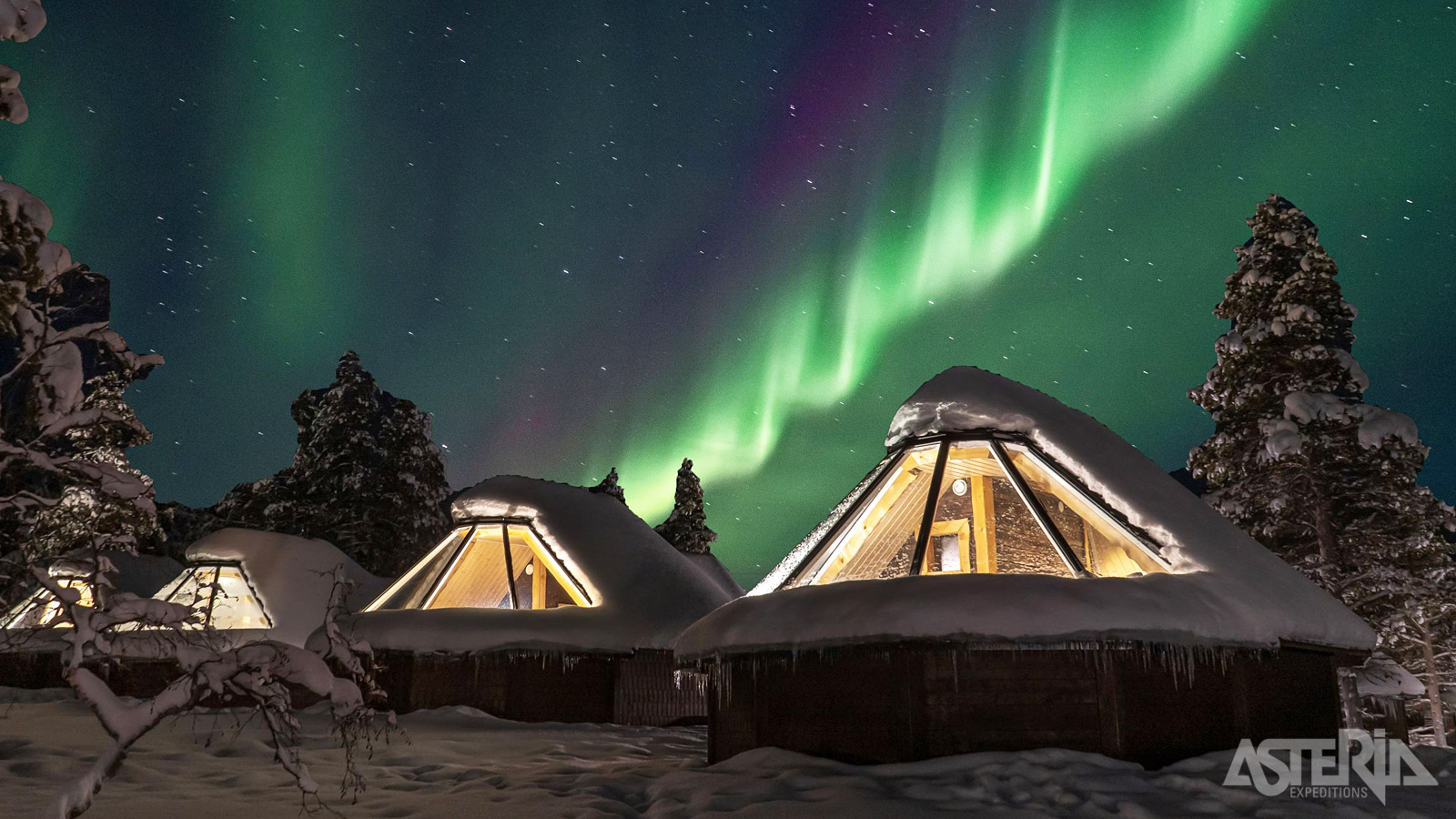 Kies voor een romantisch verblijf met zicht op  de sterren vanuit een Aurora Cabin