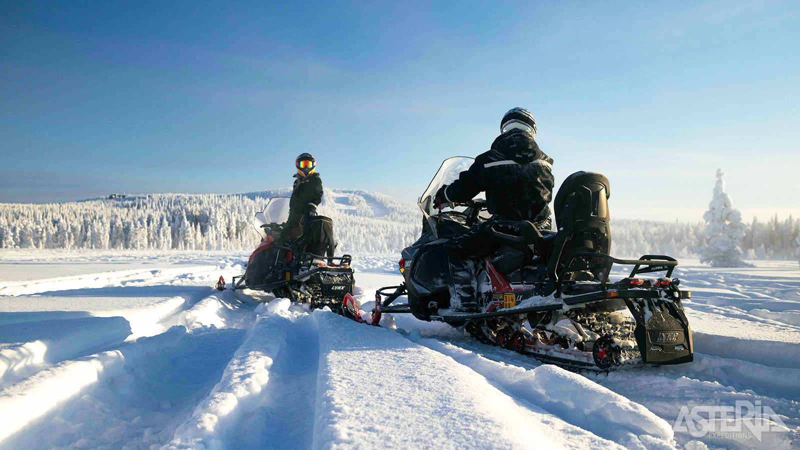 Een tocht per sneeuwscooter is de ideale manier om de prachtige landschappen te ontdekken