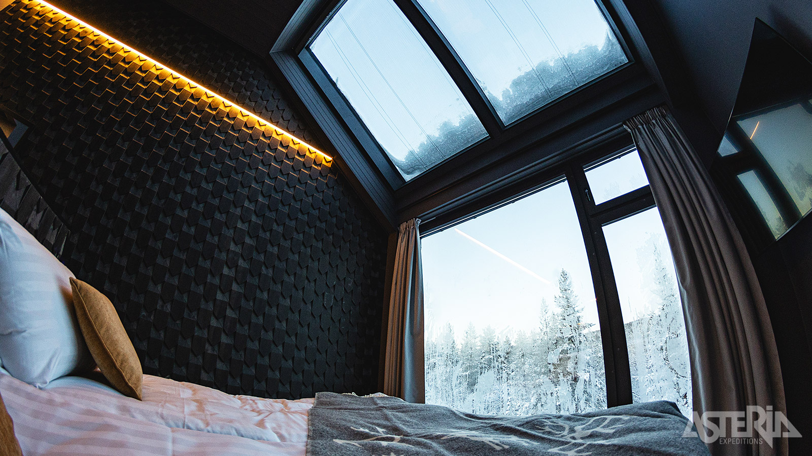 Aurora Rooms beschikken over glazen dak zodat je ’s nachts het noorderlicht vanuit je bed kan zien